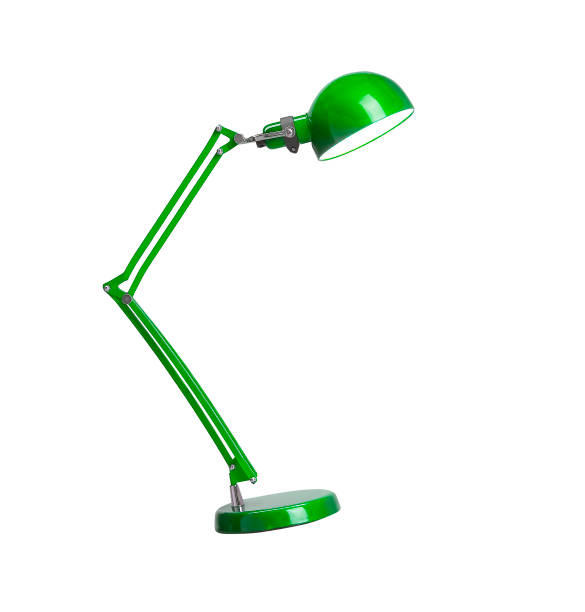 istock Vintage green desk lamp isolated 1428672743