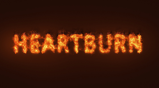 It feels like fire! The word HEARTBURN in flames.