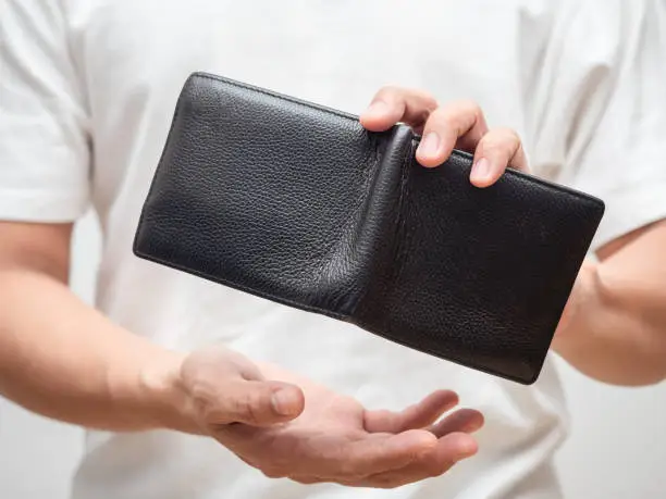 Close-up male hand shaking wallet find money,Wallet no money in man hand