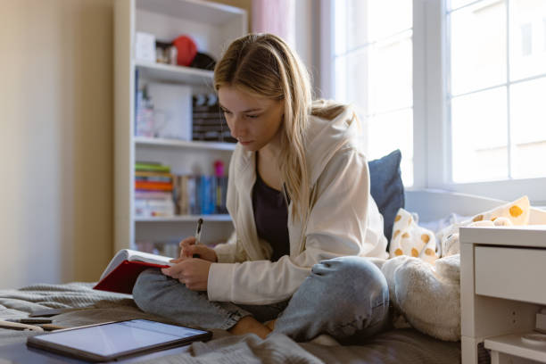 istock Girl learning at home 1428691317