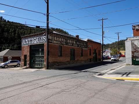 Idaho Springs, Colorado, USA-September 26, 2022: Side street in National Historic District of Idaho Springs, Colorado.