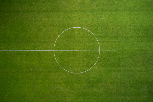 Green football field circle close up
