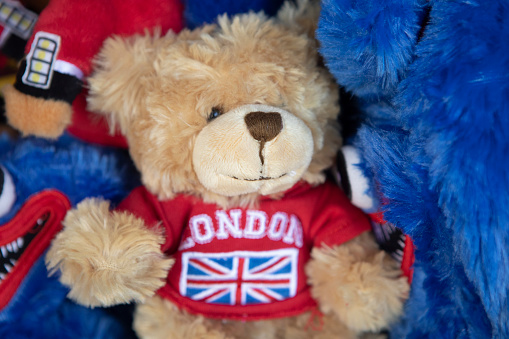 Teddy bear souvenirs on a market stall in London, in summer