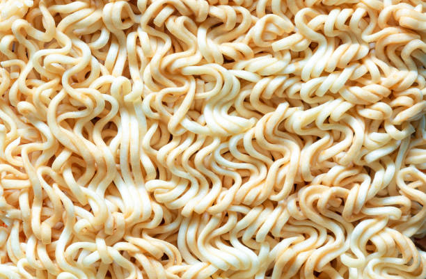 istock Macro dry noodles background,Instant noodles texture for background 1428699024