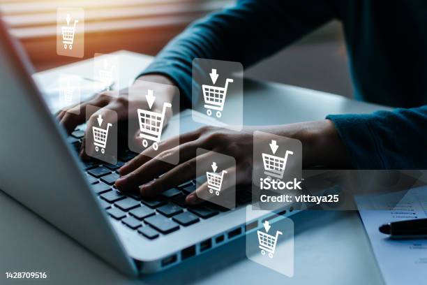 Shopping Online Woman Hand Online Shopping On Laptop Computer With Virtual Graphic Icon Diagram On Desk Payment Online Digital Marketing Business Finance Internet Network Technology Concept Stock Photo - Download Image Now