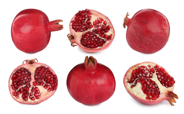 istock Set with tasty ripe pomegranates on white background 1428717367