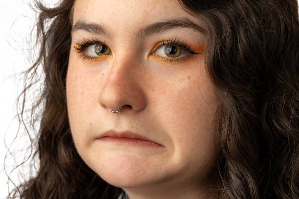 istock Young woman making a grimacing face to the camera 1428719813