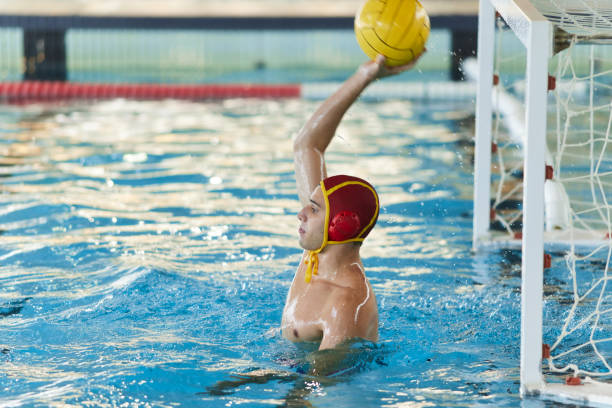 istock A water polo goalie makes a forward pass. 1428724457