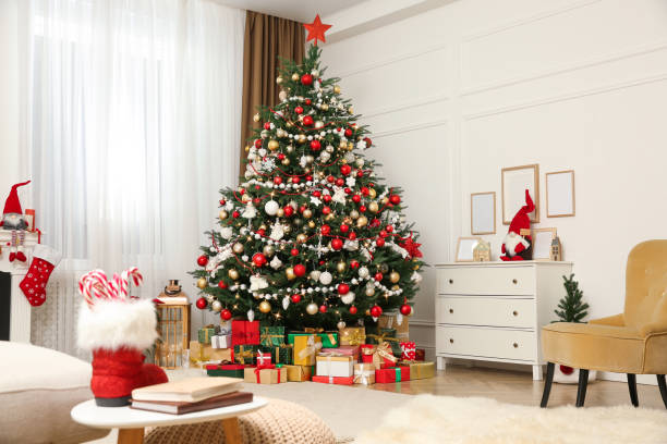 istock Festive living room interior with Christmas tree 1428724556