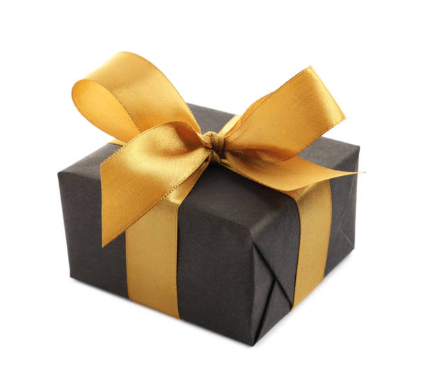 istock Black gift box with golden bow on white background 1428724906