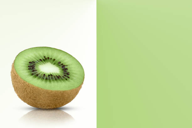 istock Half a kiwi fruit isolated on white background, copy space. 1428725094