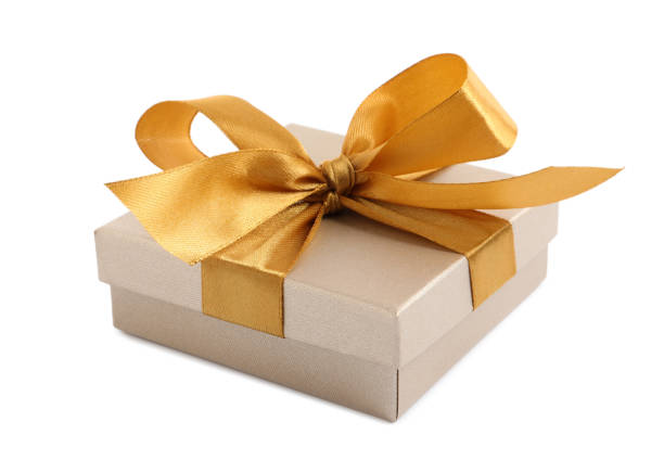 istock Golden gift box with satin bow on white background 1428726971