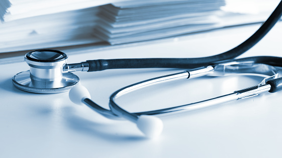 Stethoscope and medical documents