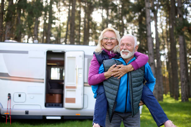 istock Happy senior couple camping in a RV 1428730069