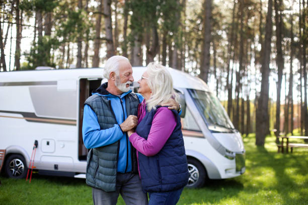 istock Senior couple camping in a RV 1428730098