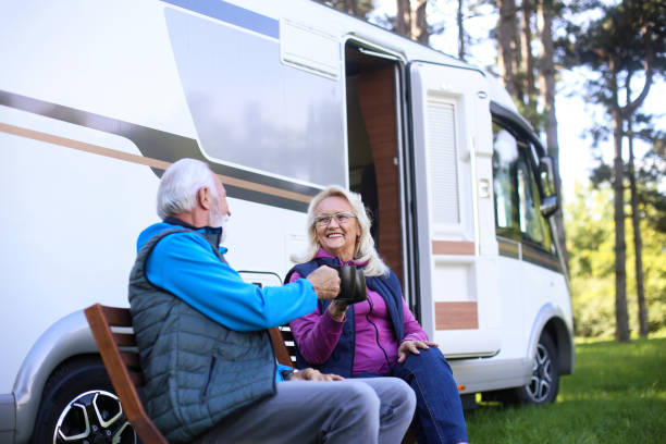 istock Senior couple camping in a RV 1428730600