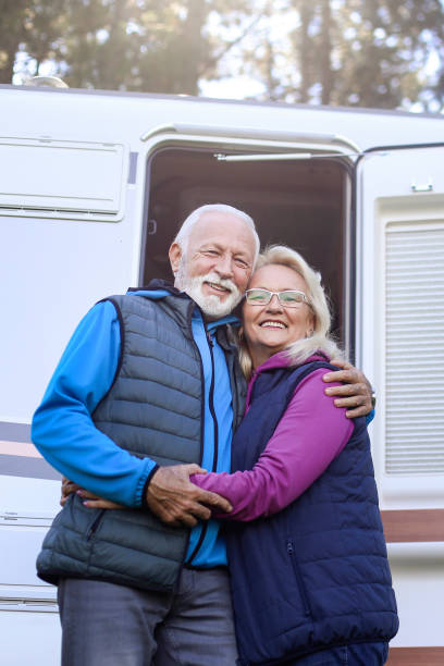 istock Happy senior couple camping in a RV 1428730752