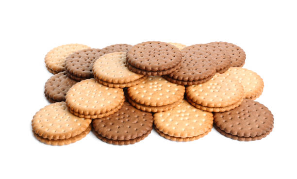istock Different tasty sandwich cookies on white background 1428733008