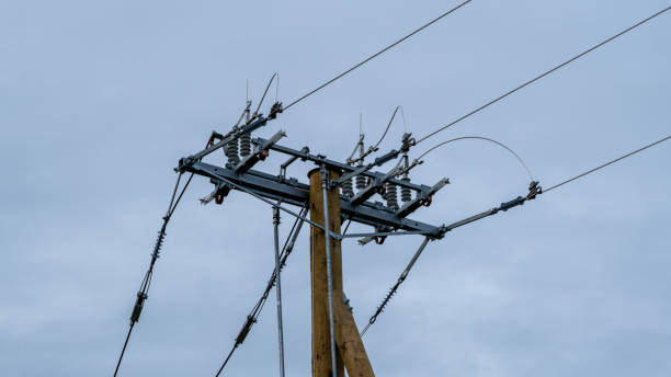 istock High-voltage disconnector on a wooden transmission line support 1428734467
