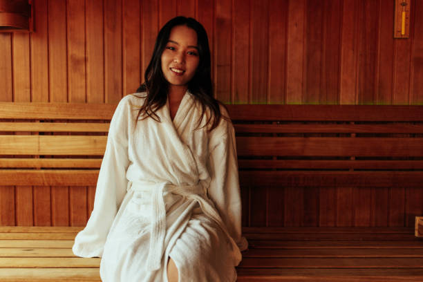 istock Smiling Asian woman in sauna. 1428739740