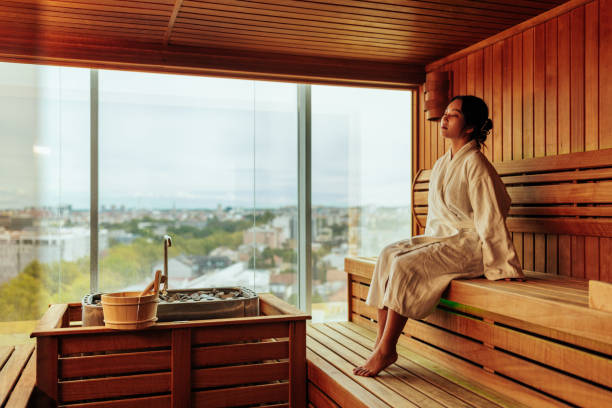 istock Woman is sauna with beautiful view. 1428739917