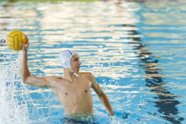 istock A professional water polo player makes a shot. 1428743015