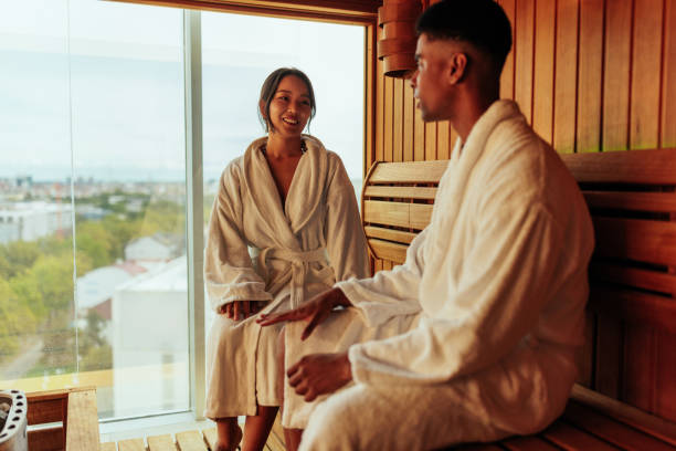 istock Multiracial couple in sauna. 1428743871