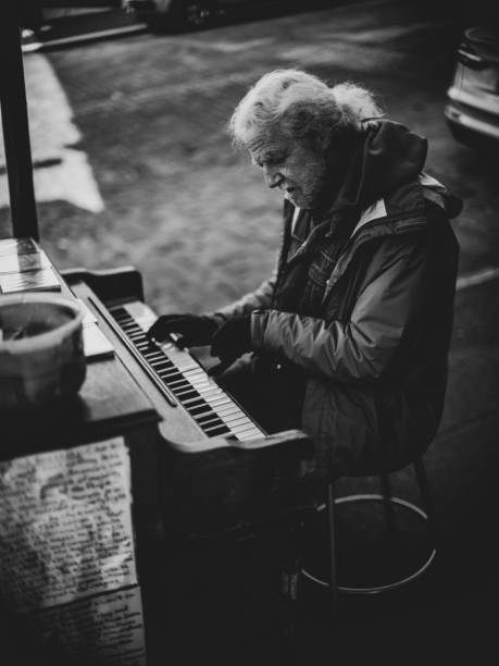 Madrid - Spain - January 7, 2022. A group of artists plays on the street where tourist are crowd.