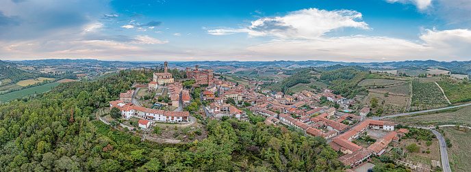 Panoramic drone picture of Castello Cereseto in Piedmont in the evening in summer