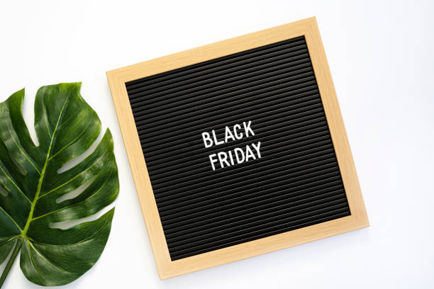istock Black friday sign on letter board over white background 1428753999