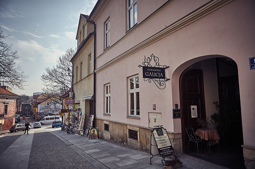 Wadowice, Poland - March 31, 2014 : Street view of sidewalk cafe in old town Wadowice