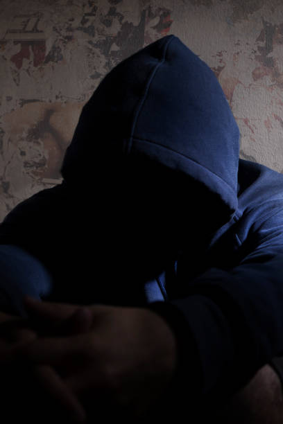 istock Stressed sad man sitting outdoors 1428768041