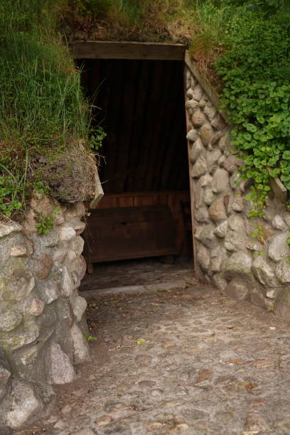 istock Stone entrance to an old underground house 1428771699