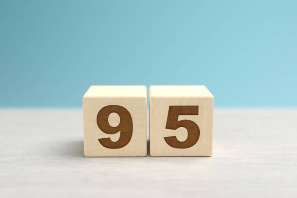 istock Wooden toy blocks forming the number 95. 1428778070