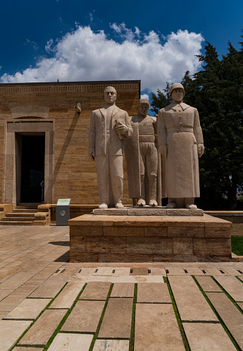 Ankara, Turkey - May 18 , 2022: Close up shoot of sculpture named Turkish men in the Anitkabir by Huseyin Ozkan.