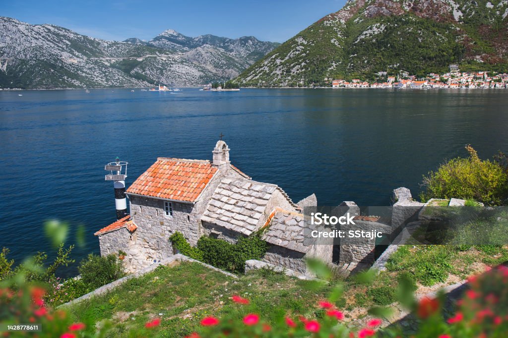 Beautiful View of Boka Kotorska Bay and Gospa od Anđela (Our Lady of the Angels) Church, Lepetane, Montenegro Adriatic Sea Stock Photo