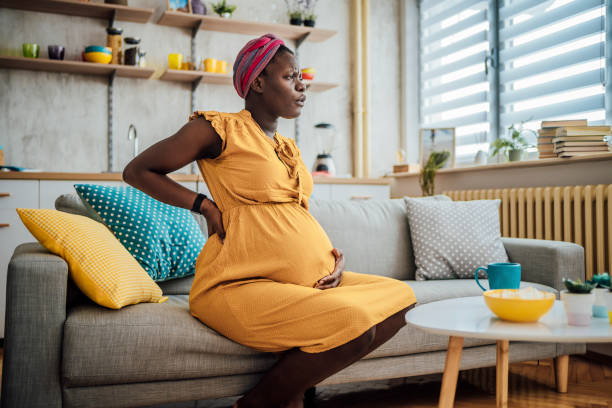 istock Pregnant woman suffering from backache 1428778686