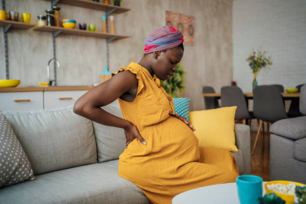 istock Pregnant woman suffering from backache 1428779505