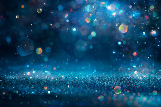 istock Shiny Blue Glitter In Abstract Defocused Background - Christmas And New Year Texture 1428781634