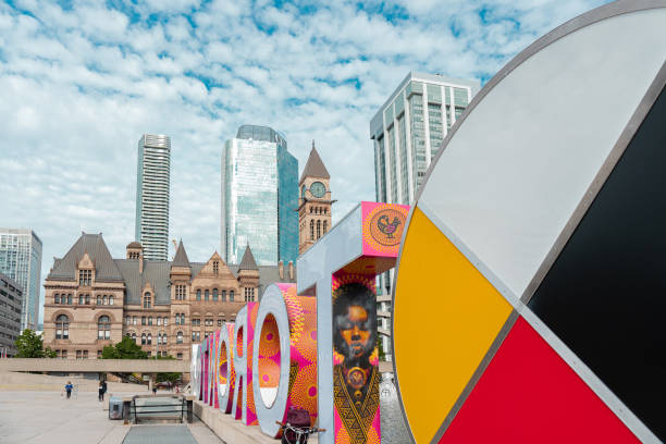 Toronto, Canada - May 28 2022: Toronto Old City Hall and Nathan Phillips Square on a cloudy day