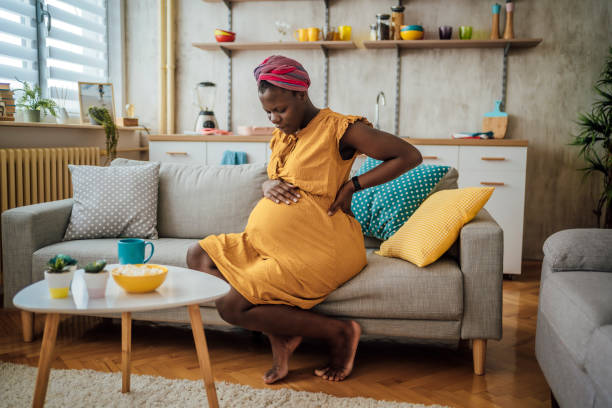 istock Pregnant woman suffering from backache 1428783577