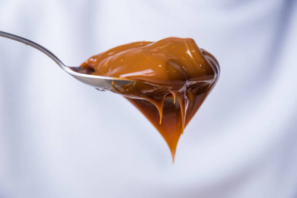 close up of spoon with dulce de leche