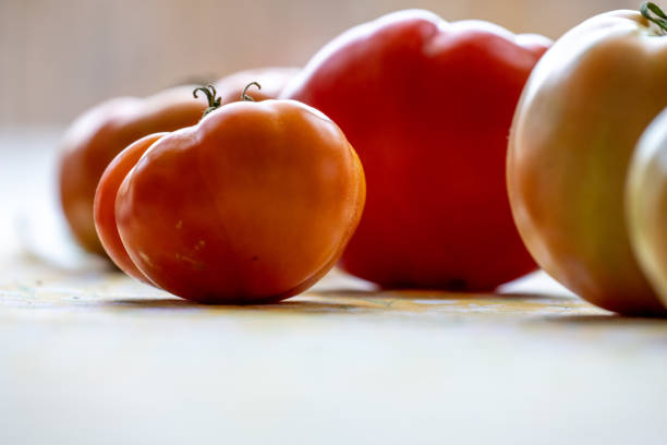 Tomatoes on a chopping board - Front view