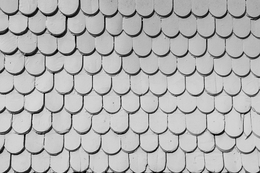 pattern of wooden roof shingles in harmonic structure
