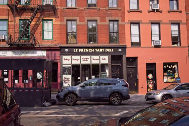 Le French Tart Deli Brooklyn, NY, USA - Sept 29, 2022: The front entrance of Le French Tart Deli with residential housing above at 44 Henry St warren street brooklyn stock pictures, royalty-free photos & images