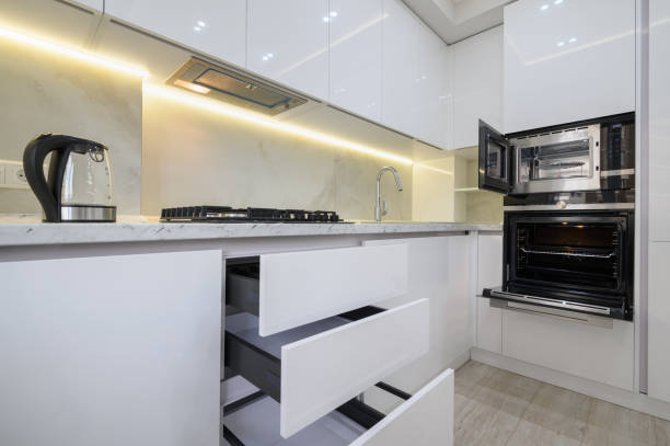 istock White modern kitchen with a stove, oven and microwave 1428797024