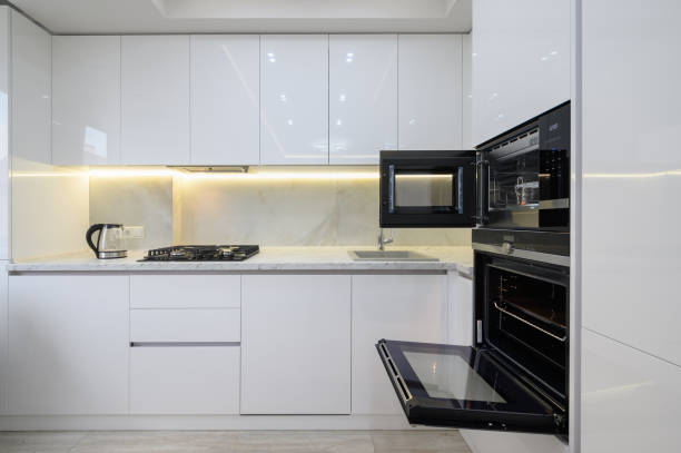 istock White modern kitchen with a stove, oven and microwave 1428797028