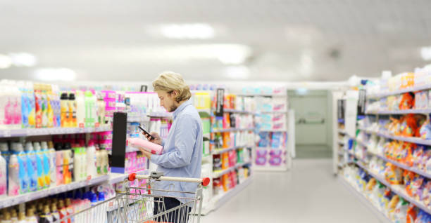 istock shopping in supermarket.(washing powder,detergent,shampoo, soap) 1428798300