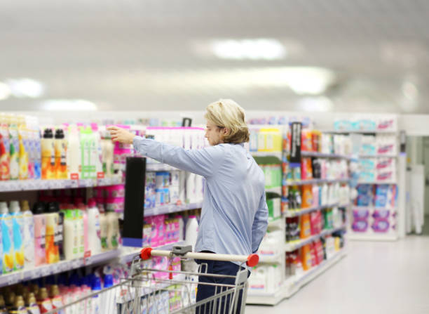 istock shopping in supermarket.(washing powder,detergent,shampoo, soap) 1428798304
