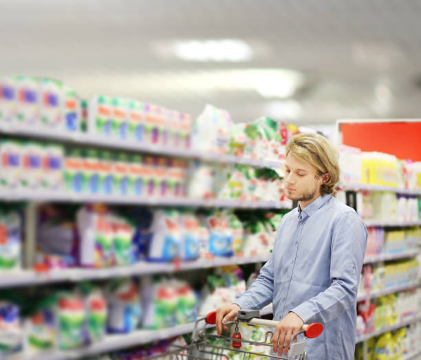 istock shopping in supermarket.(washing powder,detergent,shampoo, soap) 1428798338